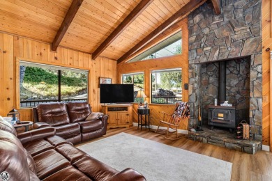 Relax and stay in this charming 3-bedroom, 2-bath cabin nestled on Pine Mountain Lake Country Club in California - for sale on GolfHomes.com, golf home, golf lot