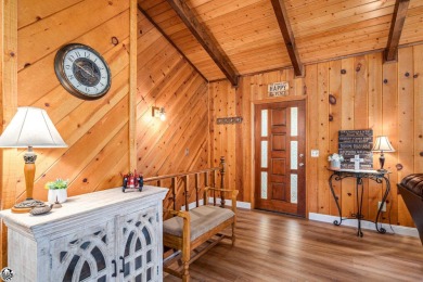 Relax and stay in this charming 3-bedroom, 2-bath cabin nestled on Pine Mountain Lake Country Club in California - for sale on GolfHomes.com, golf home, golf lot