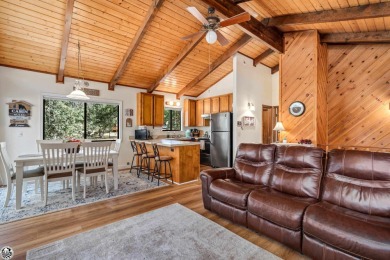 Relax and stay in this charming 3-bedroom, 2-bath cabin nestled on Pine Mountain Lake Country Club in California - for sale on GolfHomes.com, golf home, golf lot