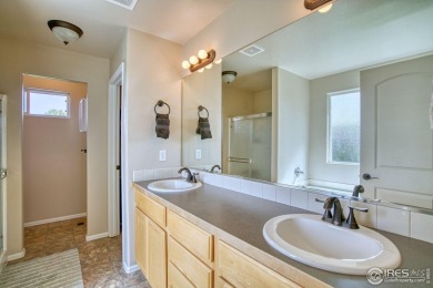 Tucked away in a quiet cul-de-sac, this spacious 3-bedroom on Pelican Lakes Golf and Country Club in Colorado - for sale on GolfHomes.com, golf home, golf lot