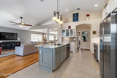 Welcome to this beautiful lakefront pool home located in the on Plantation Bay Golf and Country Club in Florida - for sale on GolfHomes.com, golf home, golf lot