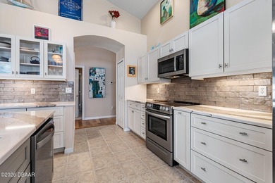 Welcome to this beautiful lakefront pool home located in the on Plantation Bay Golf and Country Club in Florida - for sale on GolfHomes.com, golf home, golf lot