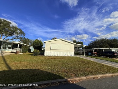 3 bedrooms 2 baths with huge bonusroom ideal for mother in law on High Point Golf Club, Inc. in Florida - for sale on GolfHomes.com, golf home, golf lot