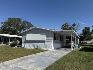 3 bedrooms 2 baths with huge bonusroom ideal for mother in law on High Point Golf Club, Inc. in Florida - for sale on GolfHomes.com, golf home, golf lot