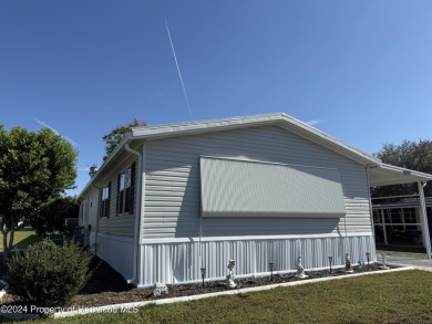 3 bedrooms 2 baths with huge bonusroom ideal for mother in law on High Point Golf Club, Inc. in Florida - for sale on GolfHomes.com, golf home, golf lot