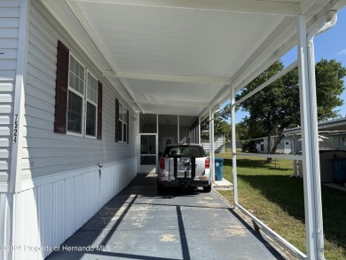 3 bedrooms 2 baths with huge bonusroom ideal for mother in law on High Point Golf Club, Inc. in Florida - for sale on GolfHomes.com, golf home, golf lot