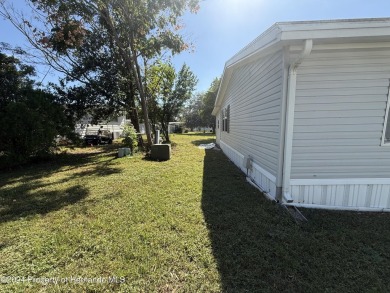 3 bedrooms 2 baths with huge bonusroom ideal for mother in law on High Point Golf Club, Inc. in Florida - for sale on GolfHomes.com, golf home, golf lot