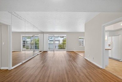 SPACIOUS ONE BEDROOM CONDO WITH ONE FULL BATH & ONE-HALF BATH on BallenIsles Golf and Country Club in Florida - for sale on GolfHomes.com, golf home, golf lot