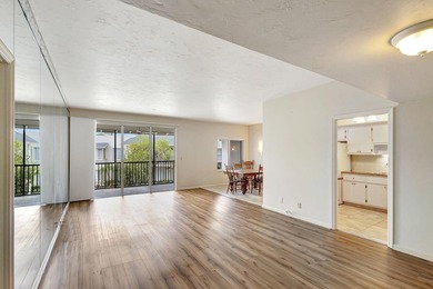 SPACIOUS ONE BEDROOM CONDO WITH ONE FULL BATH & ONE-HALF BATH on BallenIsles Golf and Country Club in Florida - for sale on GolfHomes.com, golf home, golf lot