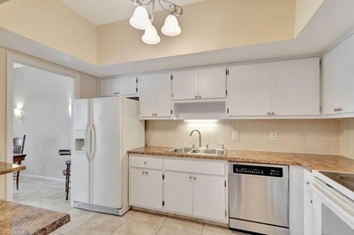 SPACIOUS ONE BEDROOM CONDO WITH ONE FULL BATH & ONE-HALF BATH on BallenIsles Golf and Country Club in Florida - for sale on GolfHomes.com, golf home, golf lot