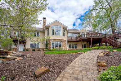 This well-maintained lakefront home has it all! Impressive stone on Old North State Club at Uwharrie Point Golf community in North Carolina - for sale on GolfHomes.com, golf home, golf lot