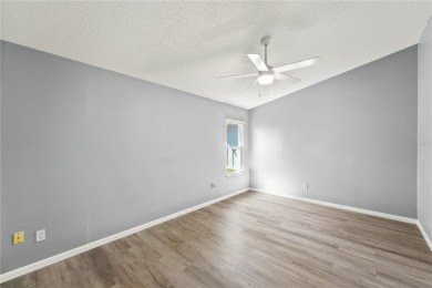 One or more photo(s) has been virtually staged. Bright and on New Smyrna Beach Golf Course in Florida - for sale on GolfHomes.com, golf home, golf lot