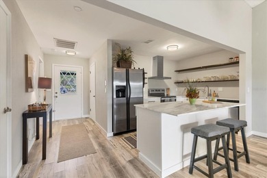 Move-in Ready! Beautifully remodeled 2-bedroom, 2-bath villa on on Capri Isle Golf Club in Florida - for sale on GolfHomes.com, golf home, golf lot