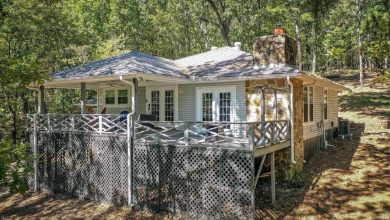 This home is currently rented.  Please call listing agent for on Indian Hills Country Club in Arkansas - for sale on GolfHomes.com, golf home, golf lot