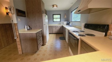 Grab this hard-to-find gem in Terre Du Lac.  This property on Terre Du Lac Golf and Country Club in Missouri - for sale on GolfHomes.com, golf home, golf lot
