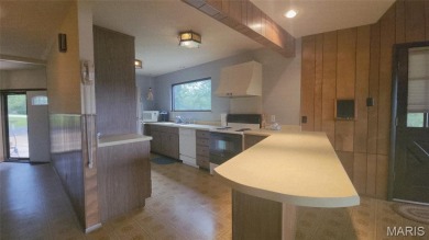 Grab this hard-to-find gem in Terre Du Lac.  This property on Terre Du Lac Golf and Country Club in Missouri - for sale on GolfHomes.com, golf home, golf lot
