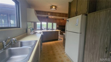 Grab this hard-to-find gem in Terre Du Lac.  This property on Terre Du Lac Golf and Country Club in Missouri - for sale on GolfHomes.com, golf home, golf lot