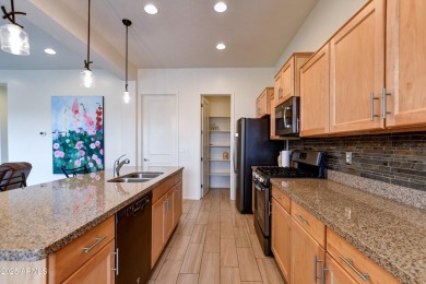 Discover this modern- comfortable home situated on a private on Quail Wood Greens Golf Course in Arizona - for sale on GolfHomes.com, golf home, golf lot