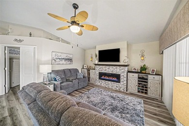 Enjoy beautiful golf course and pond views from this 2-bedroom on Tampa Bay Golf and Country Club in Florida - for sale on GolfHomes.com, golf home, golf lot