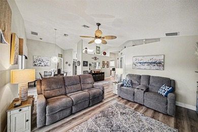 Enjoy beautiful golf course and pond views from this 2-bedroom on Tampa Bay Golf and Country Club in Florida - for sale on GolfHomes.com, golf home, golf lot