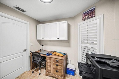 Enjoy beautiful golf course and pond views from this 2-bedroom on Tampa Bay Golf and Country Club in Florida - for sale on GolfHomes.com, golf home, golf lot