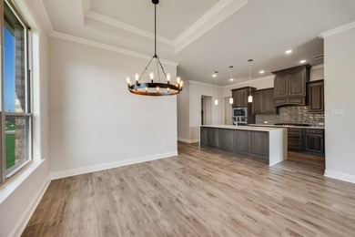 This sought-after single-story Altura Birch floorplan is now on Heath Golf and Yacht Club in Texas - for sale on GolfHomes.com, golf home, golf lot