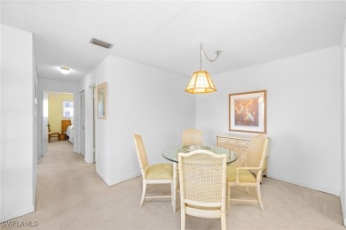 This charming second-floor Spanish Cay unit offers amazing views on Beachview Golf Club in Florida - for sale on GolfHomes.com, golf home, golf lot