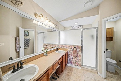 Enjoy beautiful golf course and pond views from this 2-bedroom on Tampa Bay Golf and Country Club in Florida - for sale on GolfHomes.com, golf home, golf lot