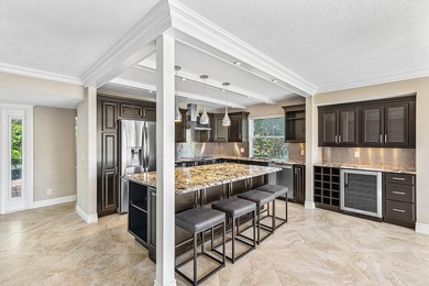 Serene lake views in this beautifully renovated 2-bedroom on Quail Ridge Golf Course and Country Club in Florida - for sale on GolfHomes.com, golf home, golf lot