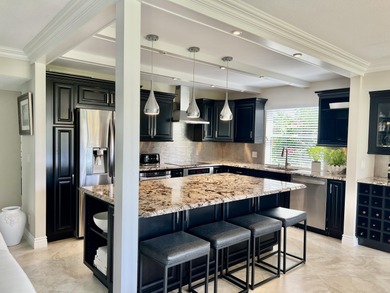 Beautifully renovated 2-bedroom, 2-bath 1st floor corner on Quail Ridge Golf Course and Country Club in Florida - for sale on GolfHomes.com, golf home, golf lot