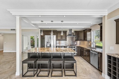 Serene lake views in this beautifully renovated 2-bedroom on Quail Ridge Golf Course and Country Club in Florida - for sale on GolfHomes.com, golf home, golf lot