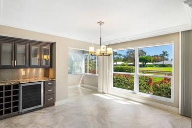 Serene lake views in this beautifully renovated 2-bedroom on Quail Ridge Golf Course and Country Club in Florida - for sale on GolfHomes.com, golf home, golf lot
