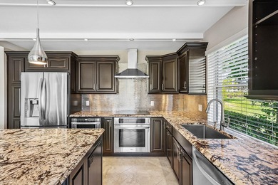 Serene lake views in this beautifully renovated 2-bedroom on Quail Ridge Golf Course and Country Club in Florida - for sale on GolfHomes.com, golf home, golf lot