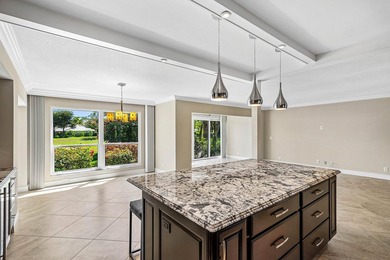 Serene lake views in this beautifully renovated 2-bedroom on Quail Ridge Golf Course and Country Club in Florida - for sale on GolfHomes.com, golf home, golf lot