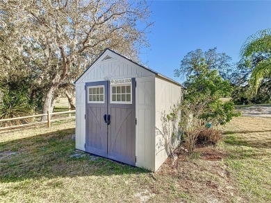 Under contract-accepting backup offers. Welcome to this on Sun Air Golf Course in Florida - for sale on GolfHomes.com, golf home, golf lot