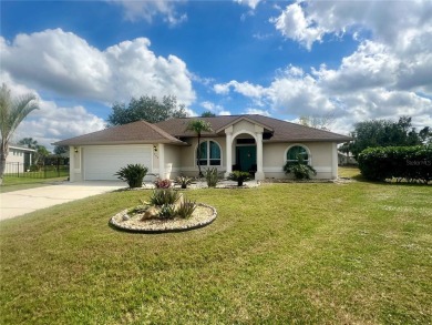 Move right in to this 3/2 with bonus room and garage on a on Seminole Lakes Country Club in Florida - for sale on GolfHomes.com, golf home, golf lot