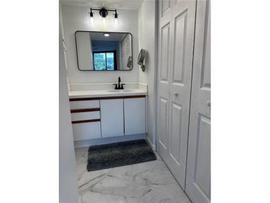 Discover the best of resort-style living in this well-kept on Cove Cay Country Club in Florida - for sale on GolfHomes.com, golf home, golf lot