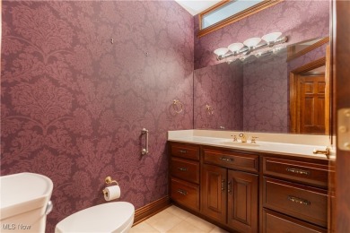 Welcome to this breathtaking brick estate, perfectly positioned on Glenmoor Country Club in Ohio - for sale on GolfHomes.com, golf home, golf lot