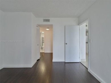 Step inside with me. Newly remodeled luxury condo in Aventura on Turnberry Isle Resort and Club in Florida - for sale on GolfHomes.com, golf home, golf lot