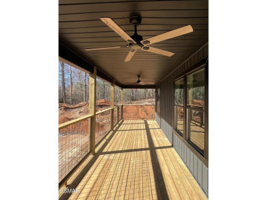 This brand new home is located just a minute from the Golf on Smoky Mountain Country Club in Tennessee - for sale on GolfHomes.com, golf home, golf lot