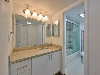 Step inside with me. Newly remodeled luxury condo in Aventura on Turnberry Isle Resort and Club in Florida - for sale on GolfHomes.com, golf home, golf lot