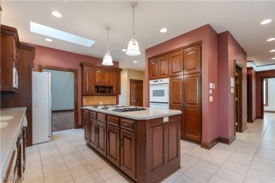 Welcome to this breathtaking brick estate, perfectly positioned on Glenmoor Country Club in Ohio - for sale on GolfHomes.com, golf home, golf lot