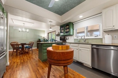 Imagine starting your day with the golf course just steps away on Desert Hawk At Pueblo West in Colorado - for sale on GolfHomes.com, golf home, golf lot