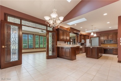 Welcome to this breathtaking brick estate, perfectly positioned on Glenmoor Country Club in Ohio - for sale on GolfHomes.com, golf home, golf lot