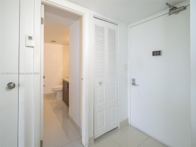 Step inside with me. Newly remodeled luxury condo in Aventura on Turnberry Isle Resort and Club in Florida - for sale on GolfHomes.com, golf home, golf lot