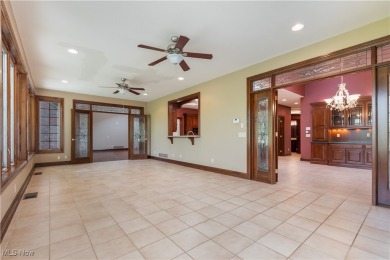 Welcome to this breathtaking brick estate, perfectly positioned on Glenmoor Country Club in Ohio - for sale on GolfHomes.com, golf home, golf lot