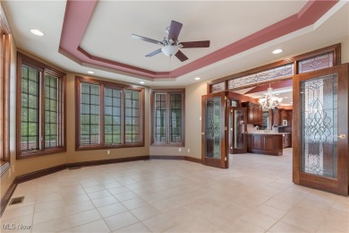 Welcome to this breathtaking brick estate, perfectly positioned on Glenmoor Country Club in Ohio - for sale on GolfHomes.com, golf home, golf lot