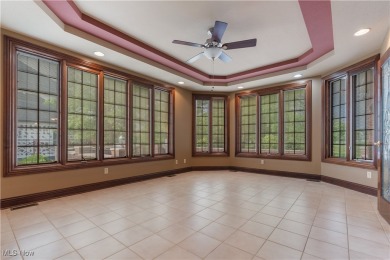 Welcome to this breathtaking brick estate, perfectly positioned on Glenmoor Country Club in Ohio - for sale on GolfHomes.com, golf home, golf lot