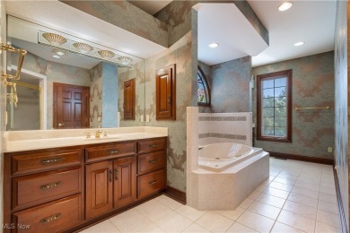 Welcome to this breathtaking brick estate, perfectly positioned on Glenmoor Country Club in Ohio - for sale on GolfHomes.com, golf home, golf lot