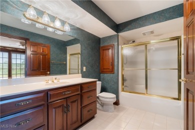 Welcome to this breathtaking brick estate, perfectly positioned on Glenmoor Country Club in Ohio - for sale on GolfHomes.com, golf home, golf lot